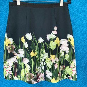black mini skit with flowers